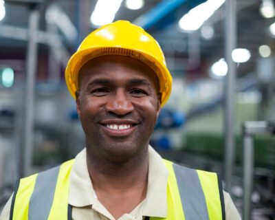 Portrait of smiling factory worker